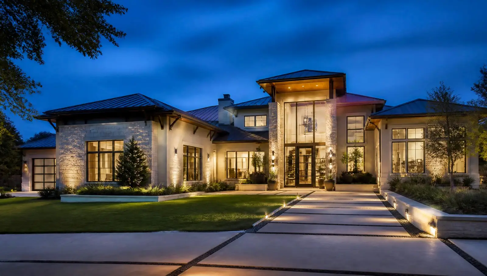 Luxury Sachse, Texas home glowing at dusk